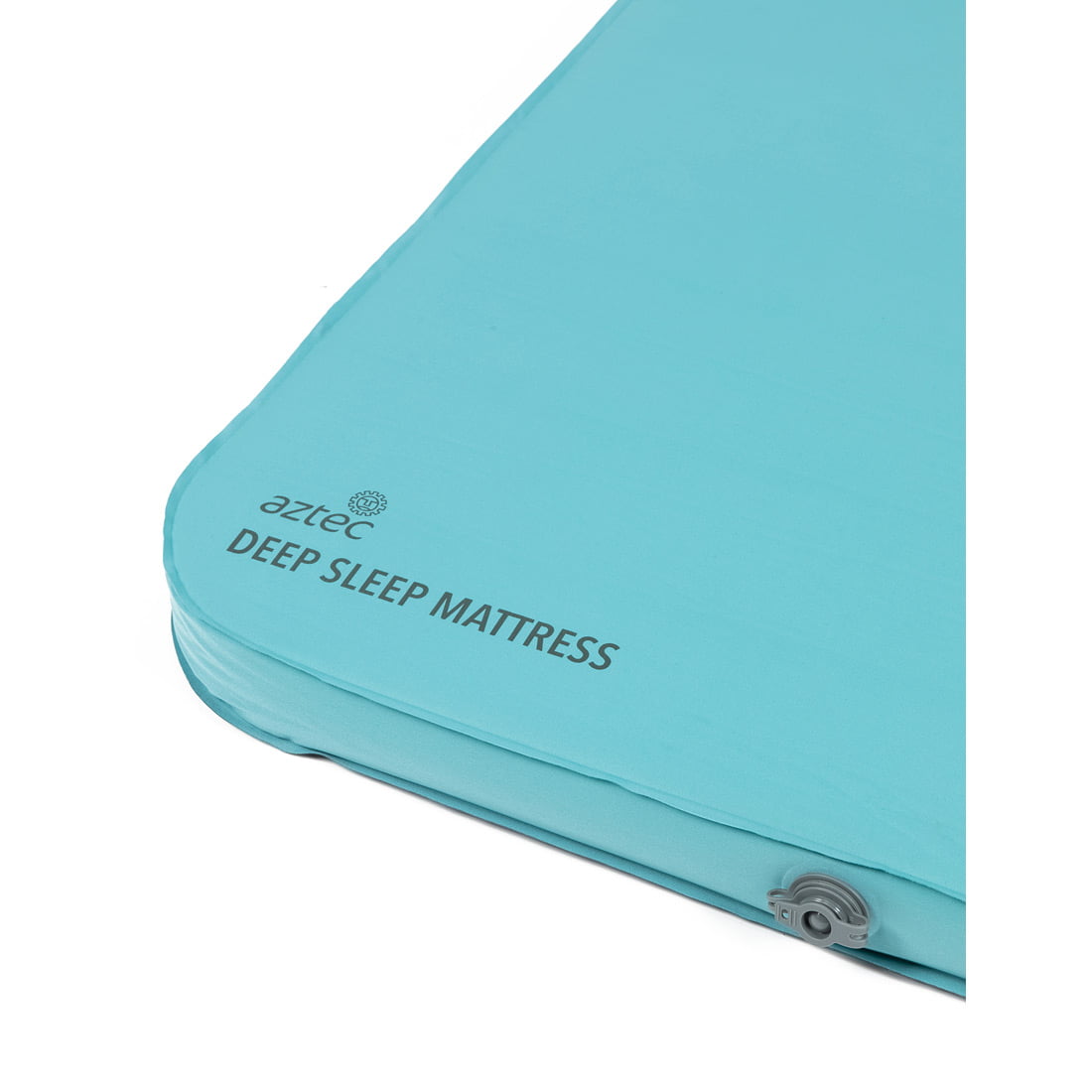 תקריב של מזרן Aztec Deep Sleep בצבע תכלת, המציג פינה עם שסתום ושמו של המוצר מודפס על פני השטח.