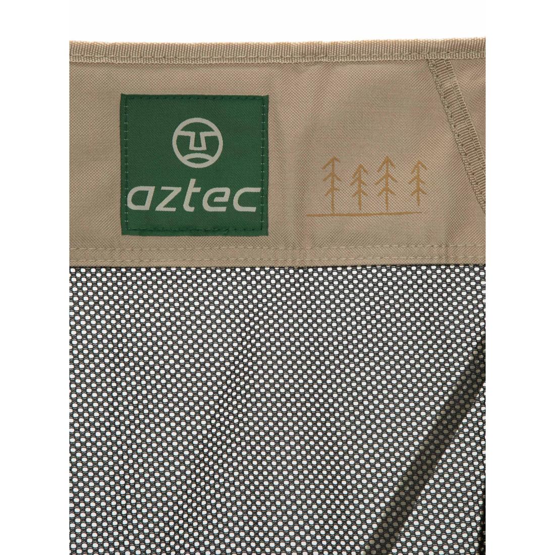 לוח Aztec Solarix Eco II כולל בד בצבעי בז' וירוק עם לוגו Aztec ירוק, איורים פשוטים של עצים, וכן חלק מרשת עם חורים קטנים ומרווחים באופן אחיד.