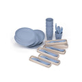 סט הפיקניק Aztec Picnic Set II Family כולל צלחות, כוסות, מזלגות, כפות וסכינים בצבע תכלת הניתנים לשימוש חוזר, חלקם במגשים בצבע בז', והכל על רקע לבן — מושלם לפיקניק המשפחתי הבא שלכם.