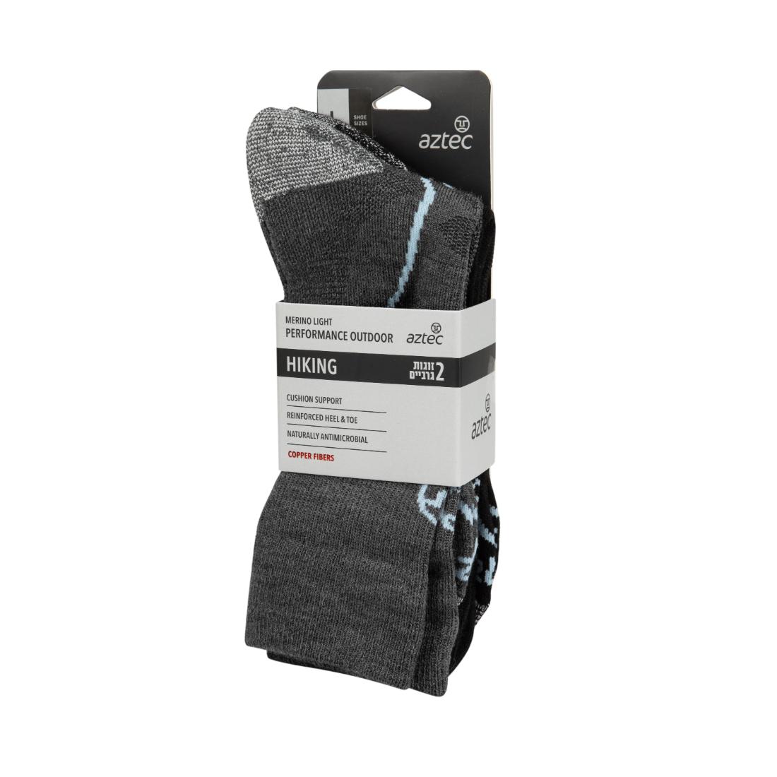 זוג גרבי טיולים Aztec Merino Light II באריזה בצבע אפור כהה, עשויים מצמר מרינו עם סיבי נחושת, תמיכה מרופדת וניהול לחות, לנוחות וקלילות במסלול. מותג: Aztec.