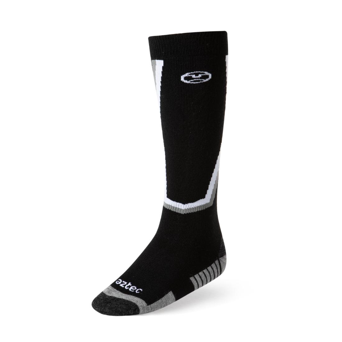 גרבי הסקי Aztec Merino Ski II הן גרביים שחורות עד הברך עם נגיעות של לבן ואפור, לוגו לבן בחלק העליון והכיתוב "aztec" על קצה הבוהן — מושלמות לאוסף ציוד הסקי שלכם.